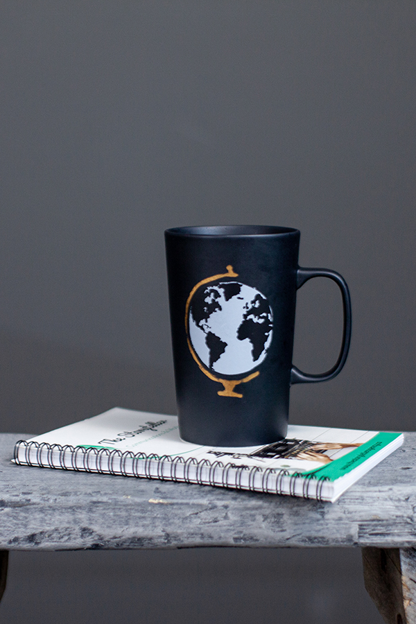 Mug with planet earth representing more responsible communications
